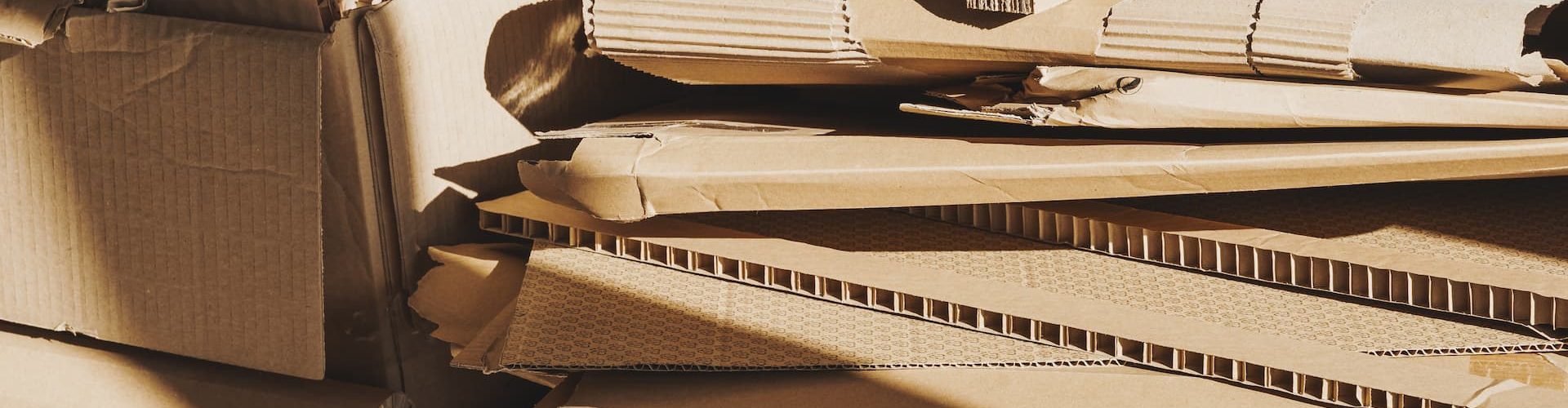 stack-of-cardboard-waste-in-sunlight-concepts-of-2024-10-13-22-15-17-utc (1)