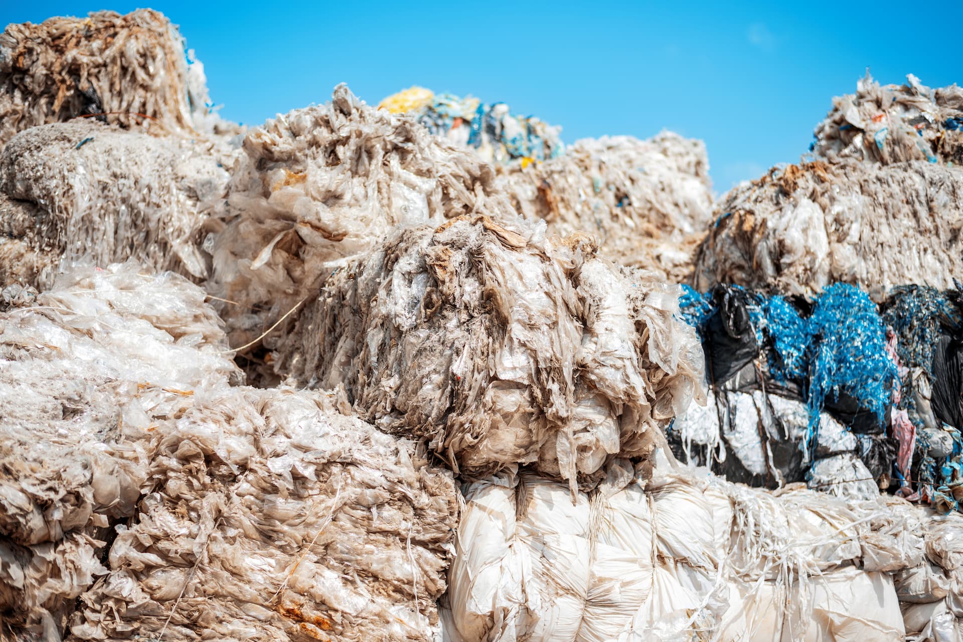 cubes-of-compressed-plastic-garbage-at-a-waste-rec-2025-02-18-14-37-13-utc (1) (1)